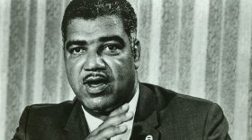 Whitney Young at a news conference.