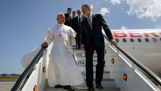 In this handout photo provided by Vatican Media, Pope Leo XIV is accompanied by King Felipe VI of Spain as he deplanes after a technical problem at Tenerife Norte-Los Rodeos International Airport in Tenerife, Spain, Friday, June 12, 2026.
