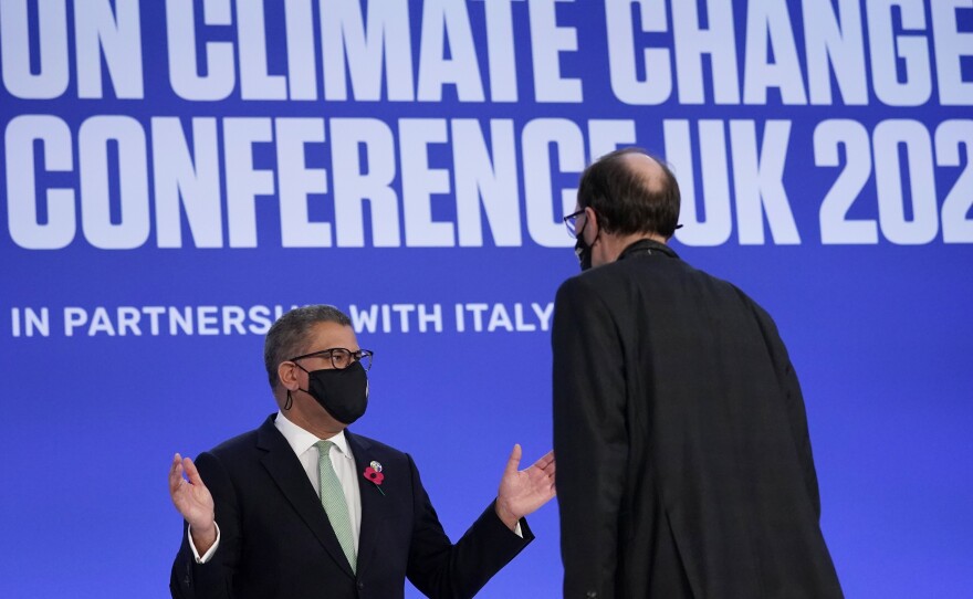 Alok Sharma (left), president of the COP26 summit, attends a stocktaking plenary session in Glasgow, Scotland, on Saturday.