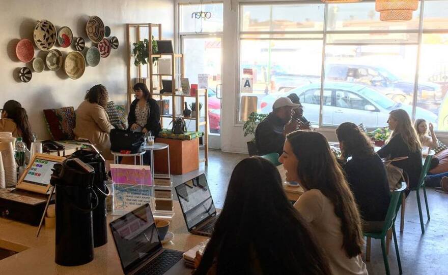 Patrons fill the tables inside the City Heights Coffee House on University Avenue in San Diego's City Heights neighborhood, Feb. 22, 2019.