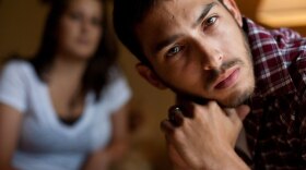 Choy, here with his wife, Monica, says he is angry that the waiver he signed relinquishes the oil company from responsibility, when responsibility on the oil rig was what the company stressed to its workers.