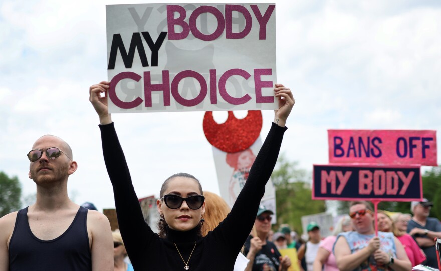 Abortion rights demonstrators rally in Union Park before marching into downtown Chicago on Saturday. The march was one of many taking place nationwide as concerns grow over a leaked draft opinion from the Supreme Court that would end federal protections for women choosing to have an abortion.