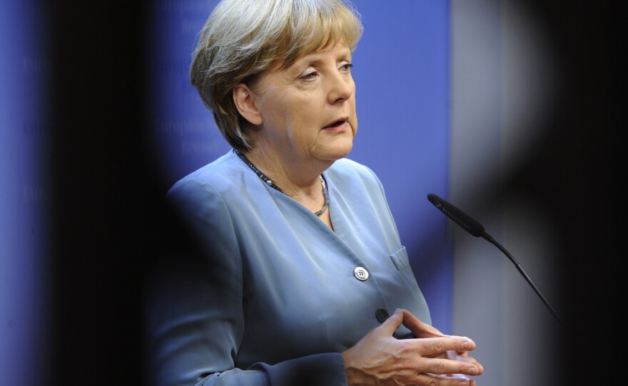 German Chancellor Angela Merkel speaks during a press conference in Brussels.