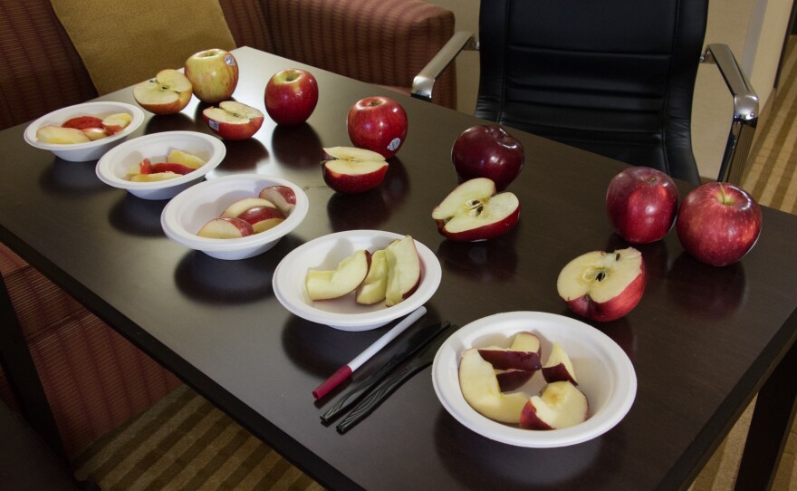 These apples put out for a taste test are (from left) Honeycrisp, Jazz, Gala, Red Delicious and Cosmic Crisp.