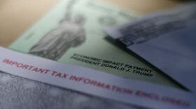 This April 23, 2020, file photo shows President Donald J. Trump's name printed on a stimulus check issued by the IRS to help combat the adverse economic effects of the new coronavirus outbreak in San Antonio. 