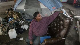 Charlene Clay is pictured sitting on her recliner in a homeless encampment in Fresno, Calif., in 2006. The American Civil Liberties Union and the Lawyers' Committee for Civil Rights sued Fresno on behalf of Clay and five other homeless people, claiming the city violated their rights by throwing out their property. In 2008, Fresno agreed to pay a $2.3 million settlement.