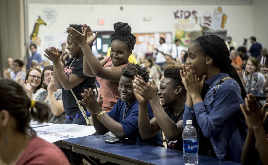 High school students applaud a classmate who spoke during a June 2017 organizing meeting for #TakeEmDown901, which formed in Memphis to protest the city's Confederate statues.