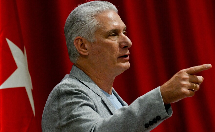 Cuban President Miguel Diaz-Canel delivers a welcome speech to participants of the "Nuestra America," or Our America Convoy at the Convention Palace in Havana, Cuba, Friday, March 20, 2026.