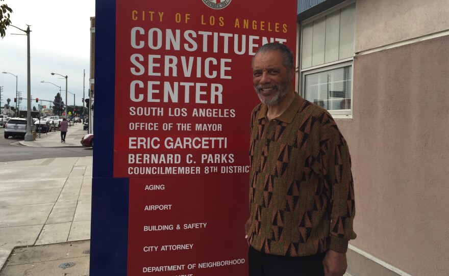 Council Member Bernard Parks stands in front of his office in South Los Angeles. He's concerned that raising the minimum wage to $15 an hour could create more unemployment.