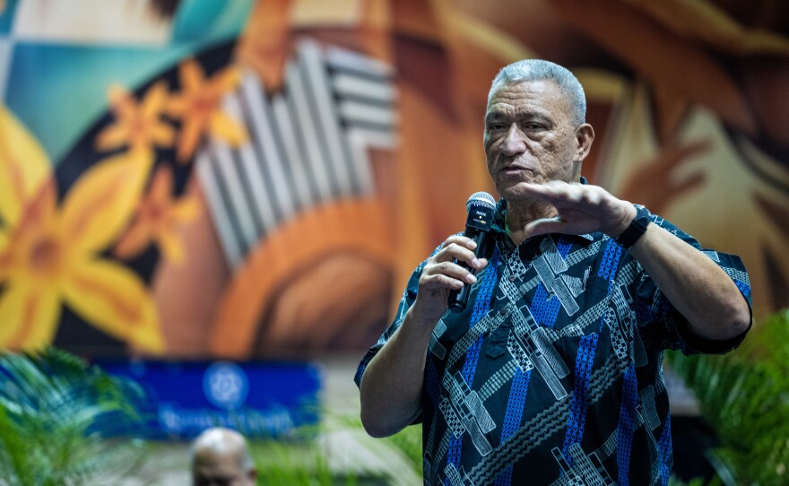 Maui Mayor Richard Bissen speaks at a weekly community meeting at the Lahaina Civic Center. He's hopeful people who lost tourism-related jobs can find new work in the cleanup and rebuilding.
