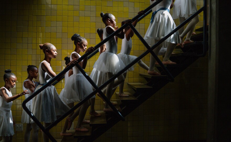 Young dancers from the Joburg Ballet School backstage at the Soweto Theatre prepare for their year-end performance. Soweto, South Africa. December 7, 2025.