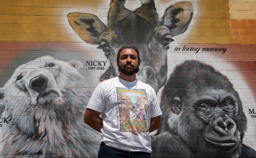 Paul Jimenez in front of the mural honoring Kalluk, Nicky and Maka at 17th Street and Market Street in San Diego on Aug. 25, 2025.