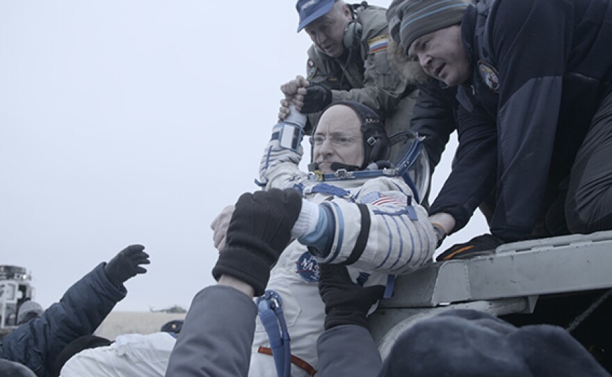 Scott Kelly returns to earth after a year in space.