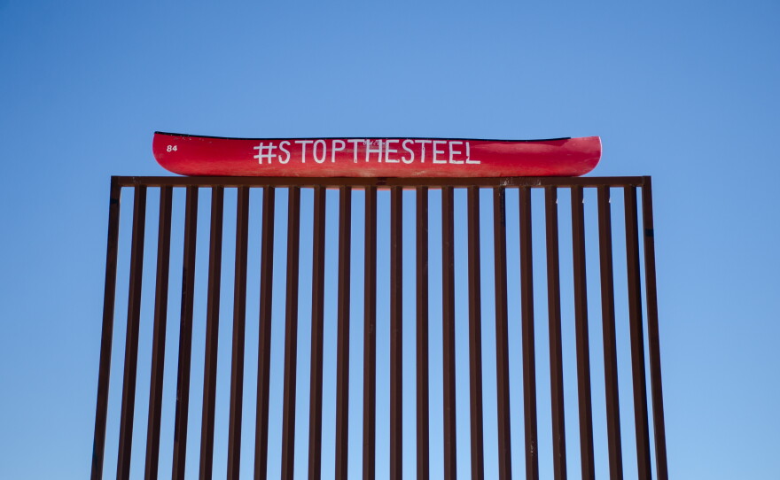 A replica of the 30-foot-tall steel wall stands outside a café in Terlingua, Texas.