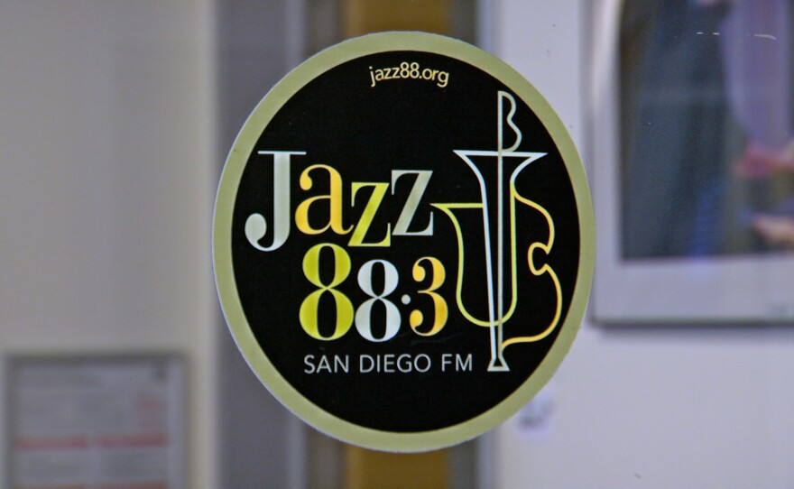 The logo of KSDS Jazz 88.3 is shown on a glass station door on August 5, 2025.