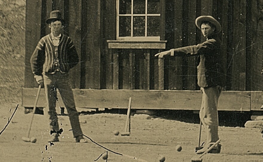 A detail of Billy the Kid (left) in the original tintype.