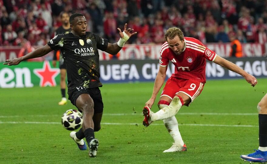 Bayern's Harry Kane scores his side's first goal during the Champions League semifinal second leg soccer match between Bayern Munich and Paris Saint Germain in Munich, Germany, Wednesday, May 6, 2026.