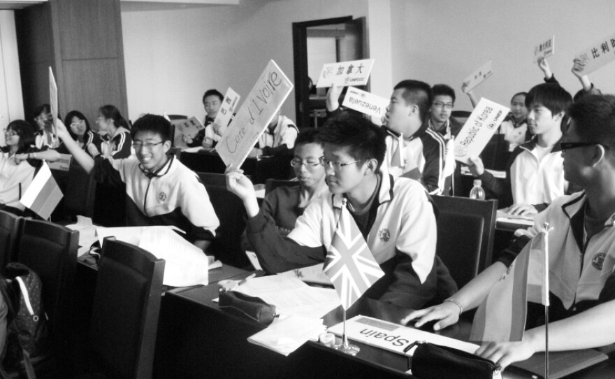 Students at one of China's top high schools, Beijing's No. 4 High School, take part in a Model United Nations debate in English. Many of China's brightest students now plan to continue their studies overseas — in part, as one 17-year-old put it, because he needs "more freedom."