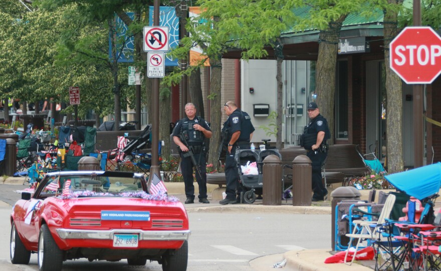 Belongings were left behind at the scene of a mass shooting along the route of a parade in Highland Park, Illinois on Monday.