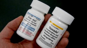 The HIV prevention drugs Descovy, left, and Truvada, right, at Pucci's Pharmacy in Sacramento, Calif., Monday, Oct. 7, 2019. 
