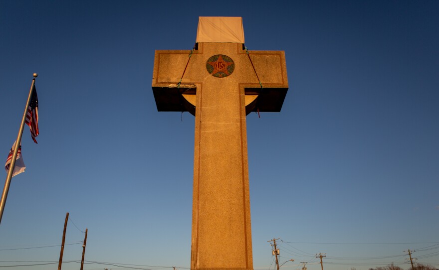 A World War I memorial cross sits in Bladensburg, Md., just outside Washington, D.C. The federal government asked the Supreme Court to rule in favor of the cross, which critics say is an unconstitutional state religious endorsement. Arguments are scheduled to be heard this week.