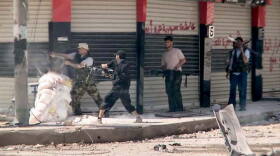 Rebel forces wage a street-by-street assault on the forces of President Bashar al-Assad in the Syrian city of Aleppo.
