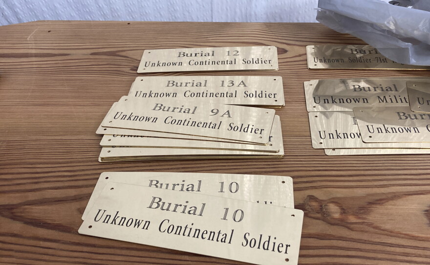 Plaques to help identify 14 unknown soldiers who were found at the site of the Battle of Camden and are being reburied are seen on Thursday, March 30, 2023, in Columbia, South Carolina. DNA analysis has recently identified one of them.