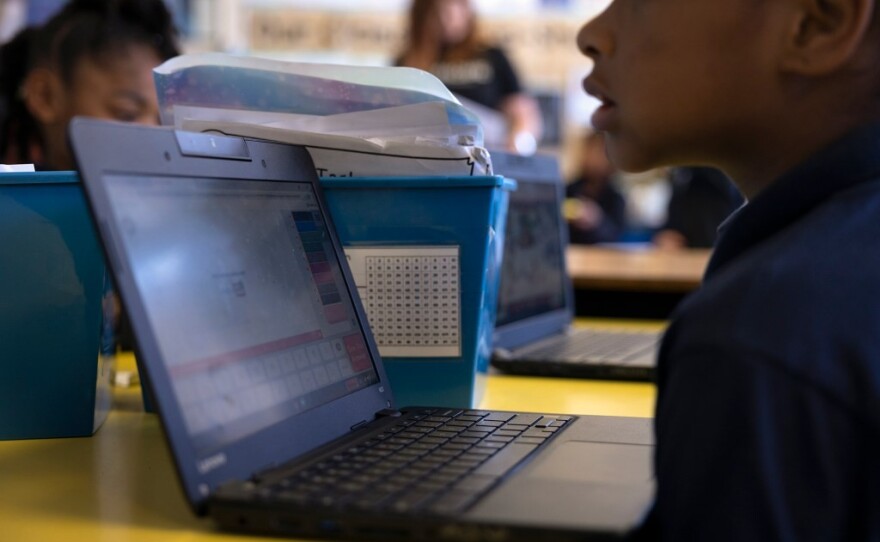 St. HOPE Public School 7 Elementary in Sacramento using a laptop computer on May 11, 2022. The school used some of its stimulus funds to buy laptops for students. 