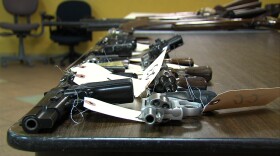 Handguns collected during the Guns For Gift Cards exchange on Dec. 21, 2012.