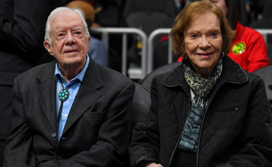 After being taken to a hospital for observation and treatment of a minor pelvic fracture, former President Jimmy Carter "is in good spirits and is looking forward to recovering at home," the Carter Center says.