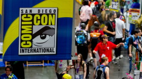 Attendees walk through the exhibit hall of the San Diego Convention Center during Comic-Con, July 23, 2026.