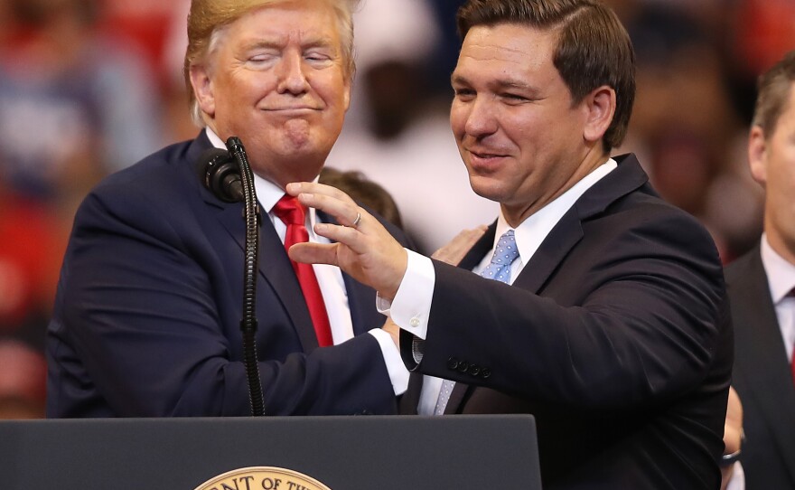 Seen in happier days: Trump helped DeSantis win a tough GOP primary for governor in 2018 and was still an ally when the two appeared together in 2019 in Sunrise, Fla.