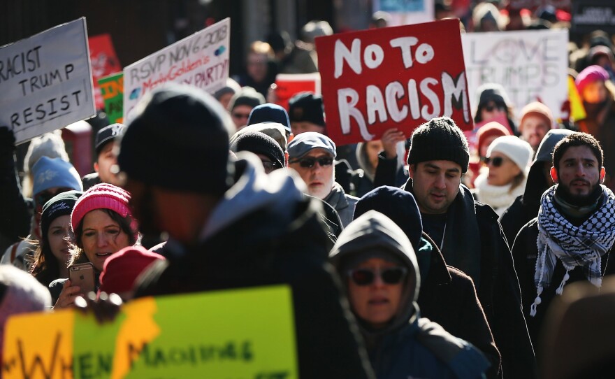 Hundreds of people demonstrate against racism in the Brooklyn neighborhood of Bay Ridge on Martin Luther King Jr. Day on Jan. 15, 2018 in New York City.