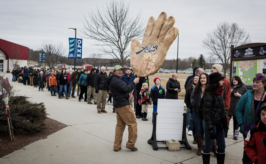 Attendees wait in line to enter a Super Tuesday night rally for Bernie Sanders in Essex Junction, Vt. The Vermont senator dominated his home state's primary, winning more than 85 percent of the vote.