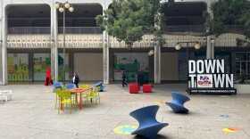 People walk through the public plaza outside Golden Hall in downtown San Diego on Jan. 21, 2026.