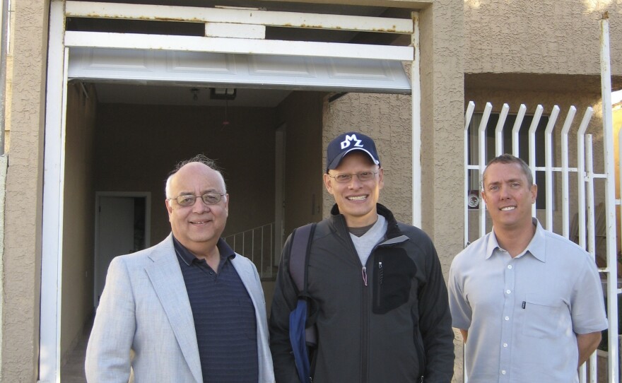 Moises Velasquez-Manoff (center) in Tijuana, Mexico, with Jorge Llamas (left) in front of the clinic where Llamas dispenses parasitic worms, and Garin Aglietti, owner of wormtherapy.com.