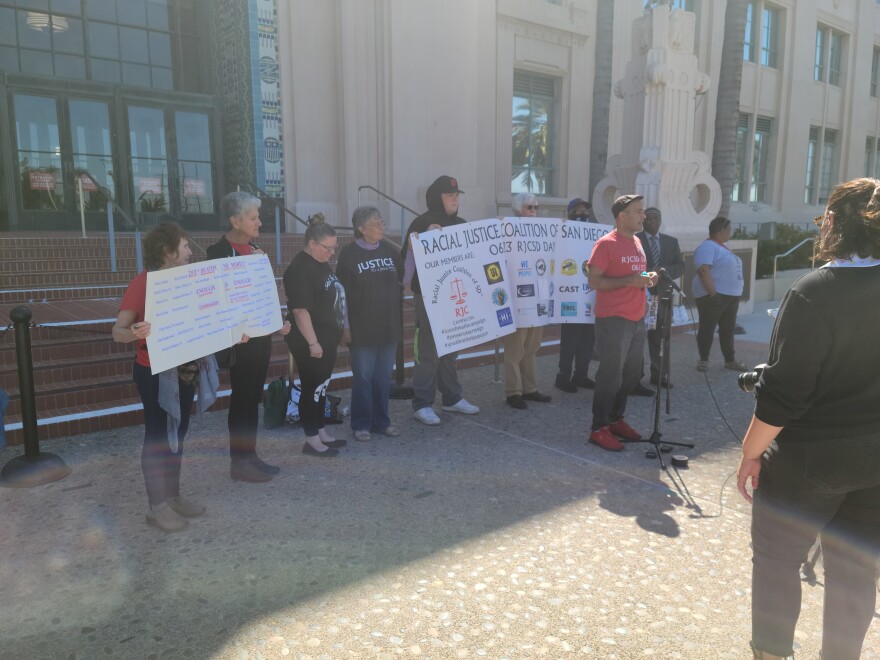 A coalition or racial justice groups hold a news conference outside the County Administration Building on March 22, 2022.