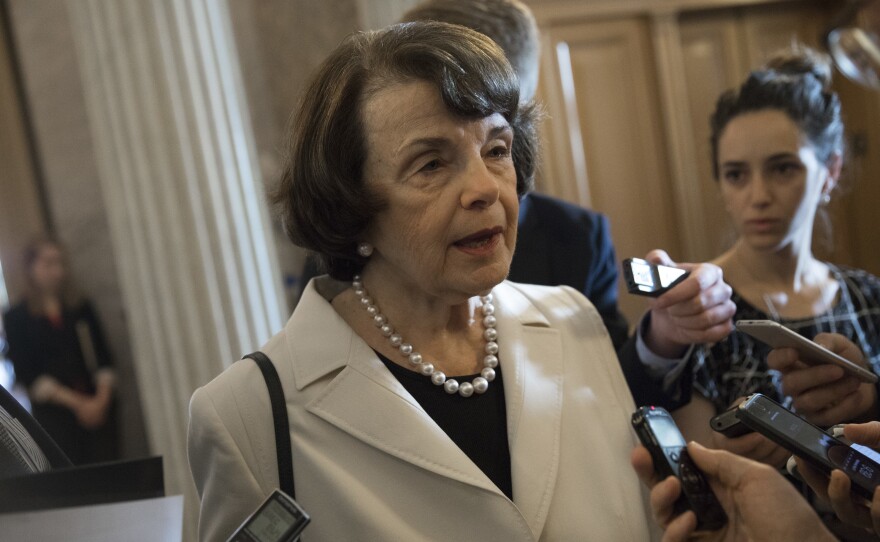 Sen. Dianne Feinstein, D-Calif., speaks to reporters on Capitol Hill on Wednesday. Senators from both parties are scrambling to react to President Trump's surprise dismissal of FBI Director James Comey.