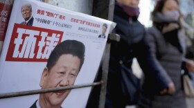 A Chinese news magazine featuring a photo of Chinese President Xi Jinping and U.S. President Donald Trump in Beijing on Feb. 9, 2017. 