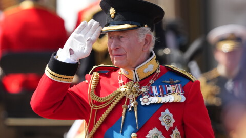 Britain's King Charles III salutes the troops outside Buckingham Palace during Trooping The Colour, the King's annual birthday parade, in London, Saturday, June 13, 2026.