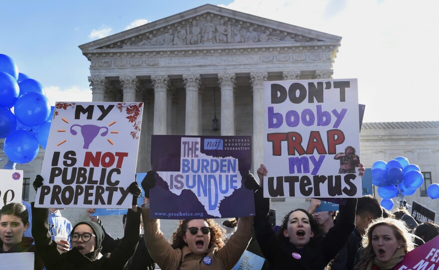 Abortion rights protesters rally outside the Supreme Court in Washington on Wednesday.