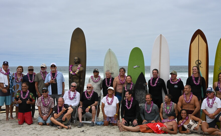 Surf invitational participants pose for a photo at Scripps Beach, Aug. 15, 2026.