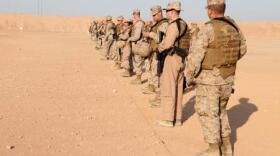 U.S. Marines with 3rd Marine Aircraft Wing (Forward) stand on the firing line at Camp Leatherneck, Helmand province, Afghanistan, Oct. 19, 2012.