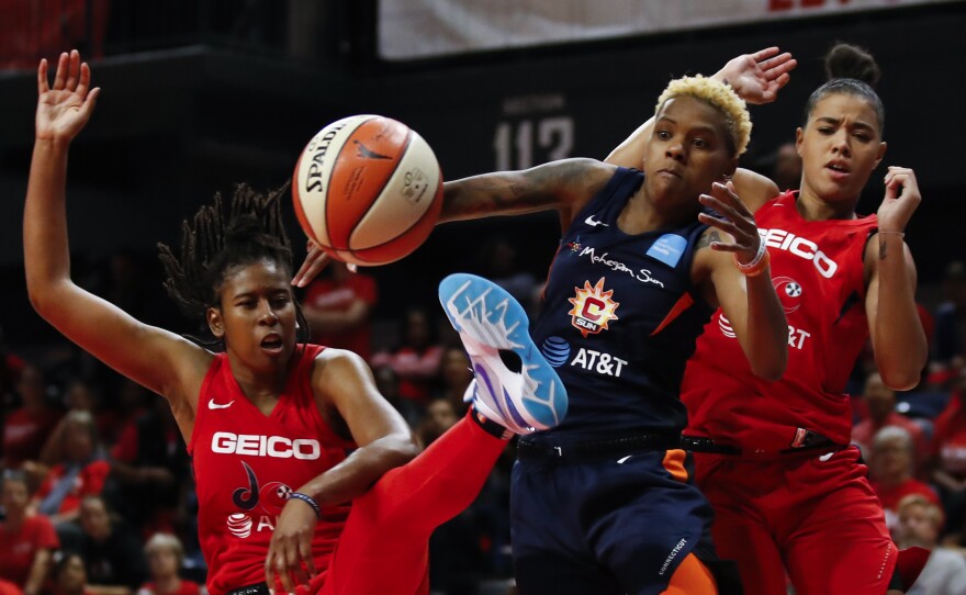 The Washington Mystics play in Game 5 of basketball's WNBA Finals in October. The league, which postponed the start of its season due to the coronavirus, announced plans to reopen in July.