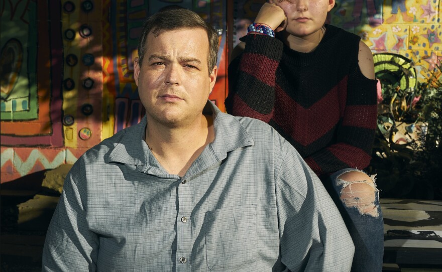 Gonzalez, seen with his daughter, Isabella, says he doesn't understand why Congress hasn't approved more help yet.