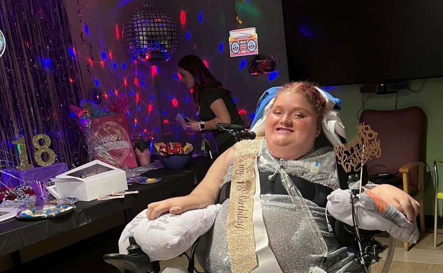 Alexis Ratcliff attends her 18th birthday party at the hospital in Winston-Salem, N.C. She is a quadriplegic who uses a ventilator and has lived at Atrium Health Wake Forest Baptist since she was 13.