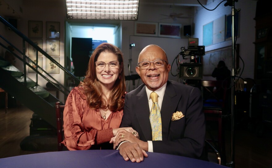 Debra Messing and Henry Louis Gates, Jr.