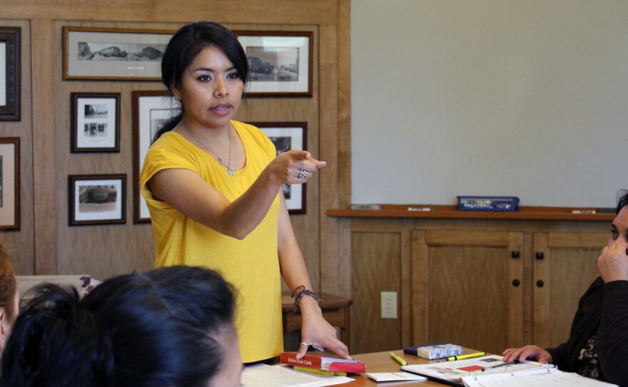 Instructor Melissa Velazquez teaches prospective naturalized citizens about U.S. civics and history.