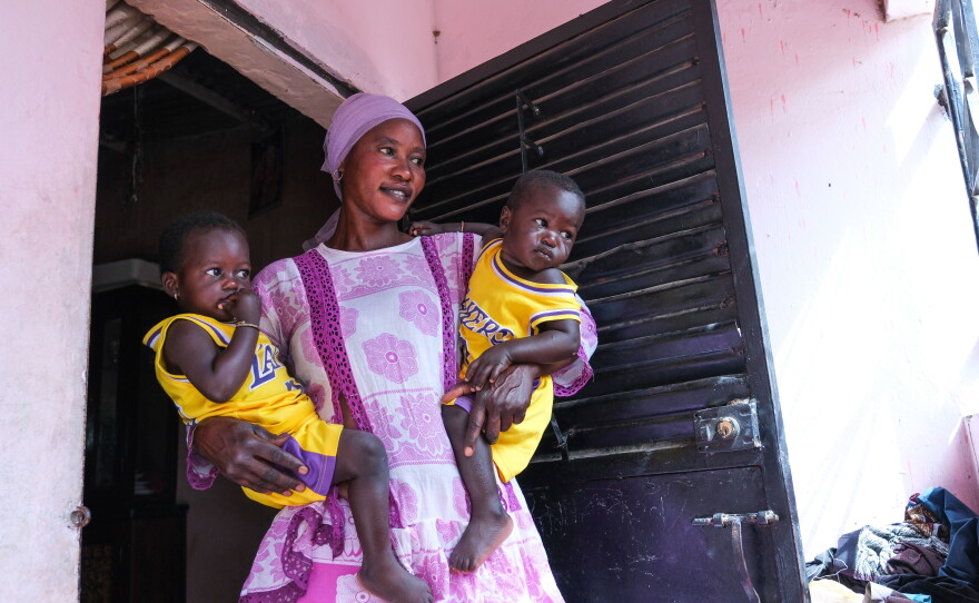 Yacine Lo and her twin children, Mame Diarra and Mame Khadim.