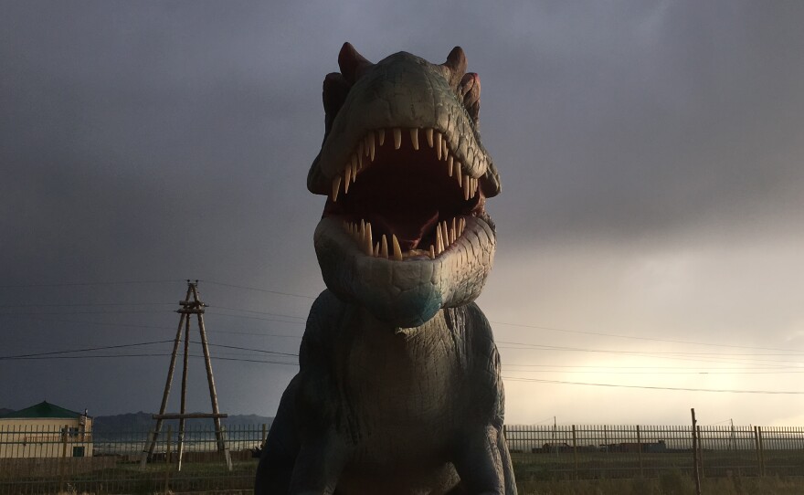 A fake dinosaur is a tourist attraction on the Silk Road in Mongolia.